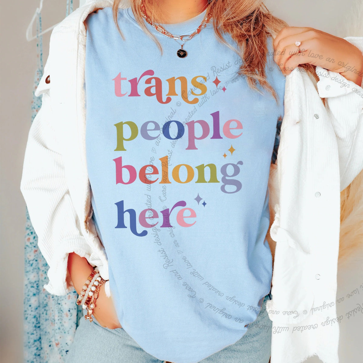 Trans People Belong Here Care & Resist progressive t-shirt in Chambray
