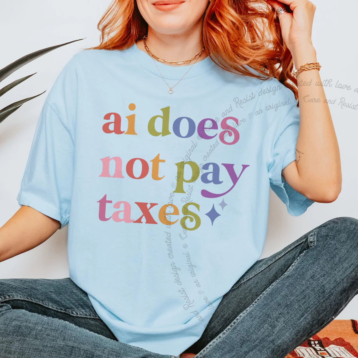 Ai Does not Pay Taxes Care & Resist tee in Chambray