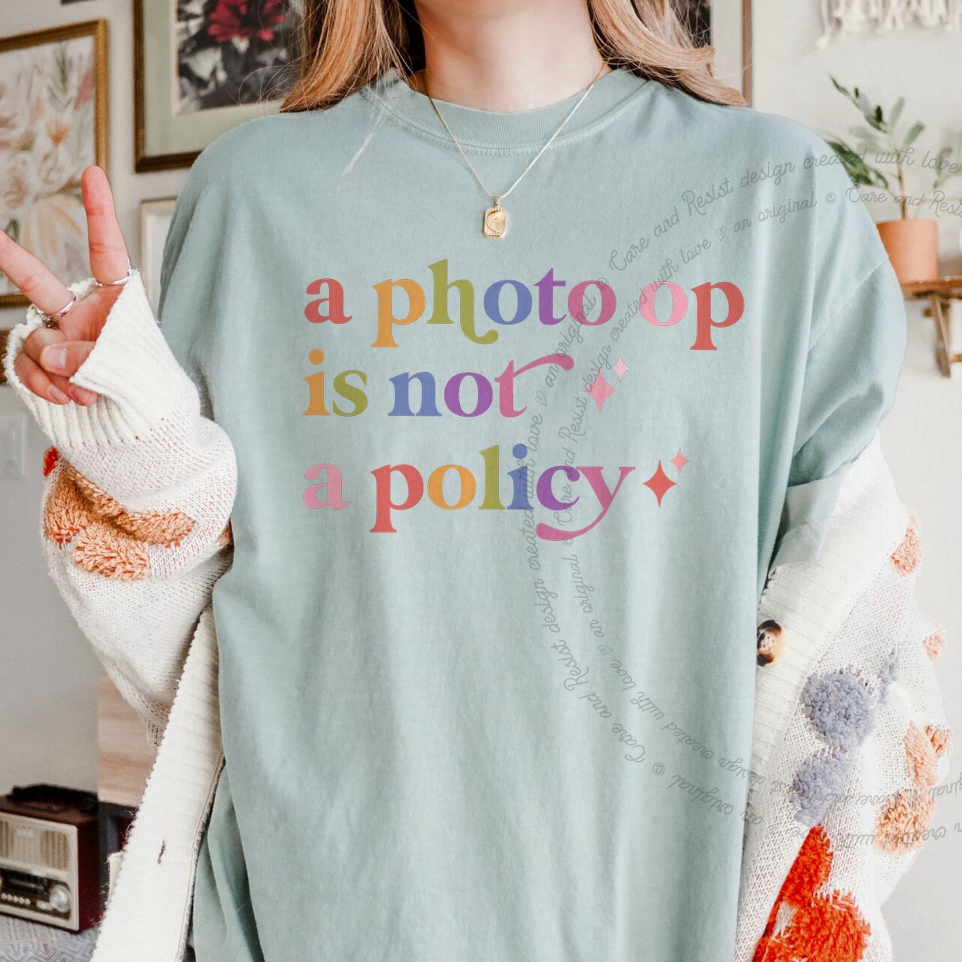 A Photo Op is not a Policy Care & Resist rainbow tee