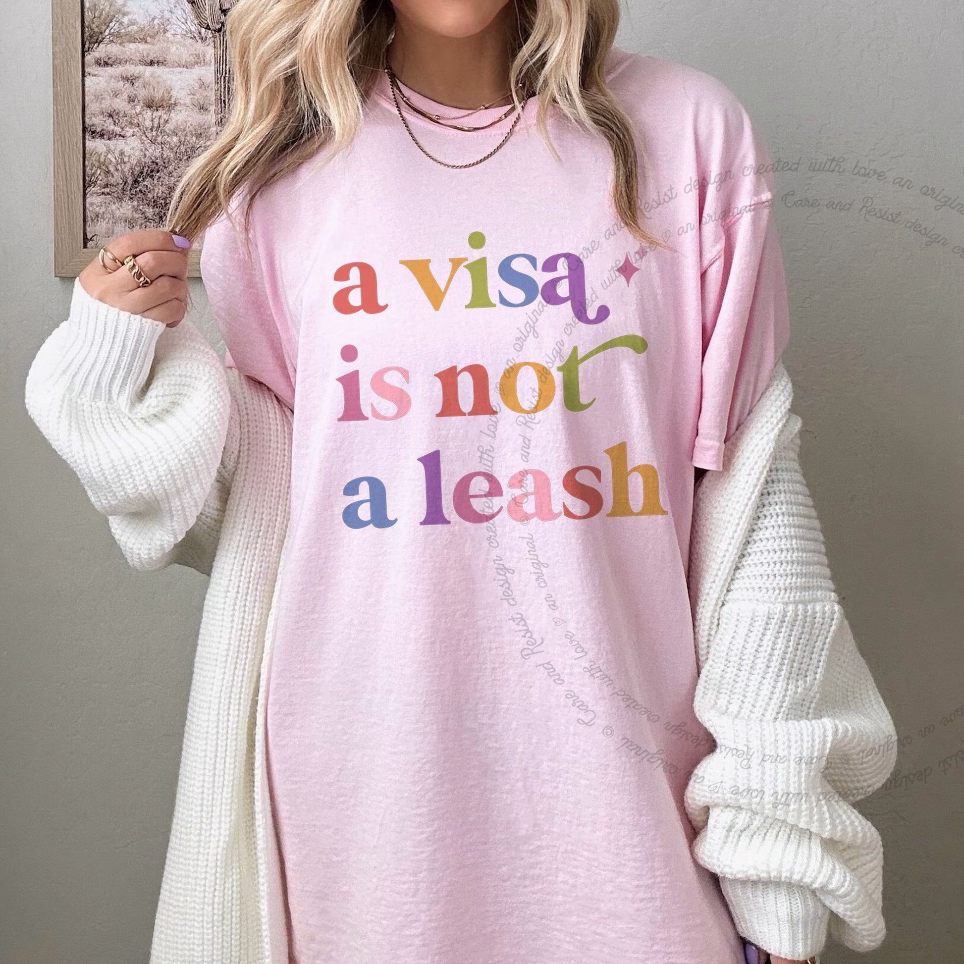 A Visa is not a Leash Care & Resist rainbow Comfort Colors tee, Blossom