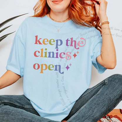Keep the Clinics Open Care & Resist rainbow Comfort Colors tee, Chambray