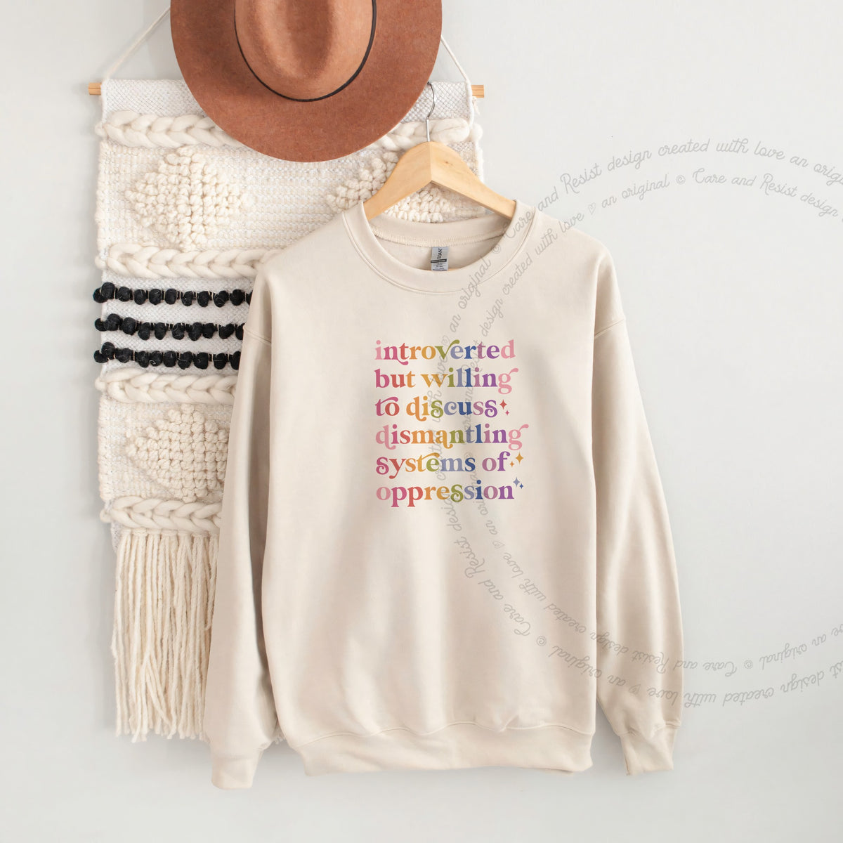 Introverted but Willing to Discuss Dismantling Systems of Oppression Care & Resist Gildan crewneck sweatshirt in Sand