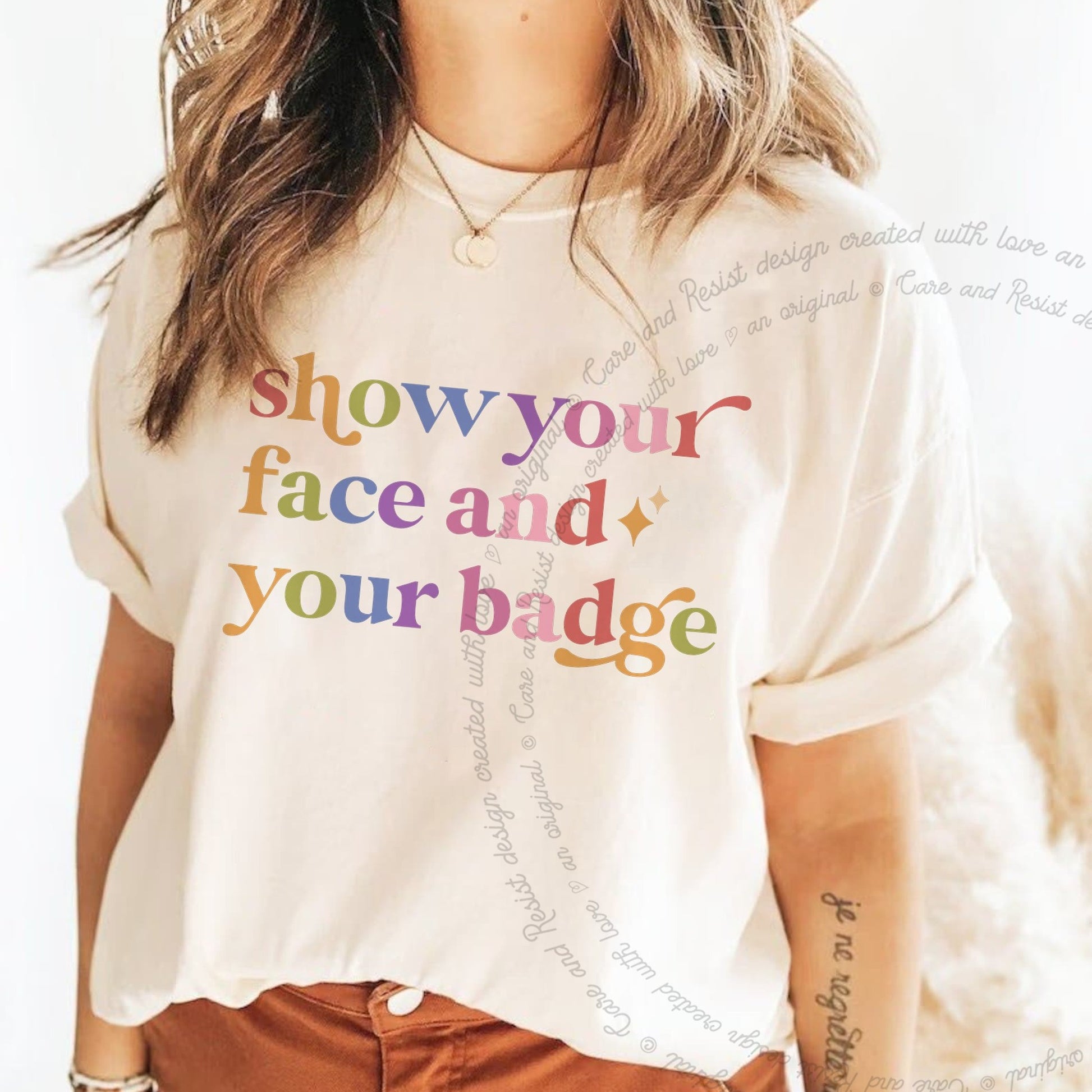 Show Your Face and Your Badge Care & Resist rainbow Comfort Colors tee, Ivory