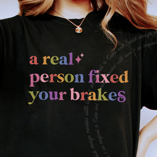 A Real Person Fixed Your Brakes Care & Resist progressive t-shirt in Black