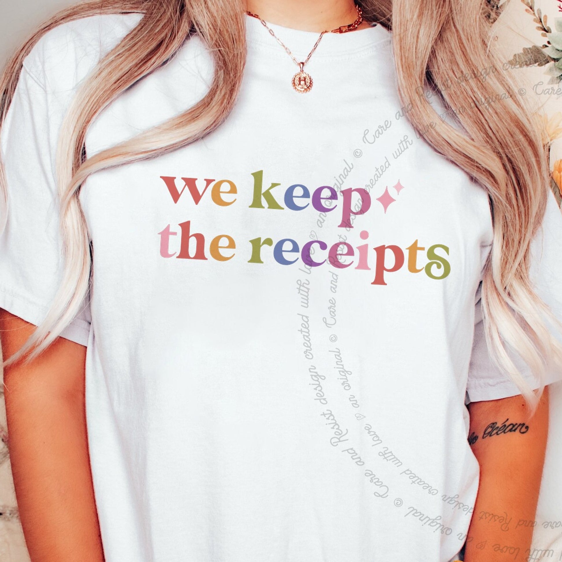 We Keep the Receipts Care & Resist rainbow tee