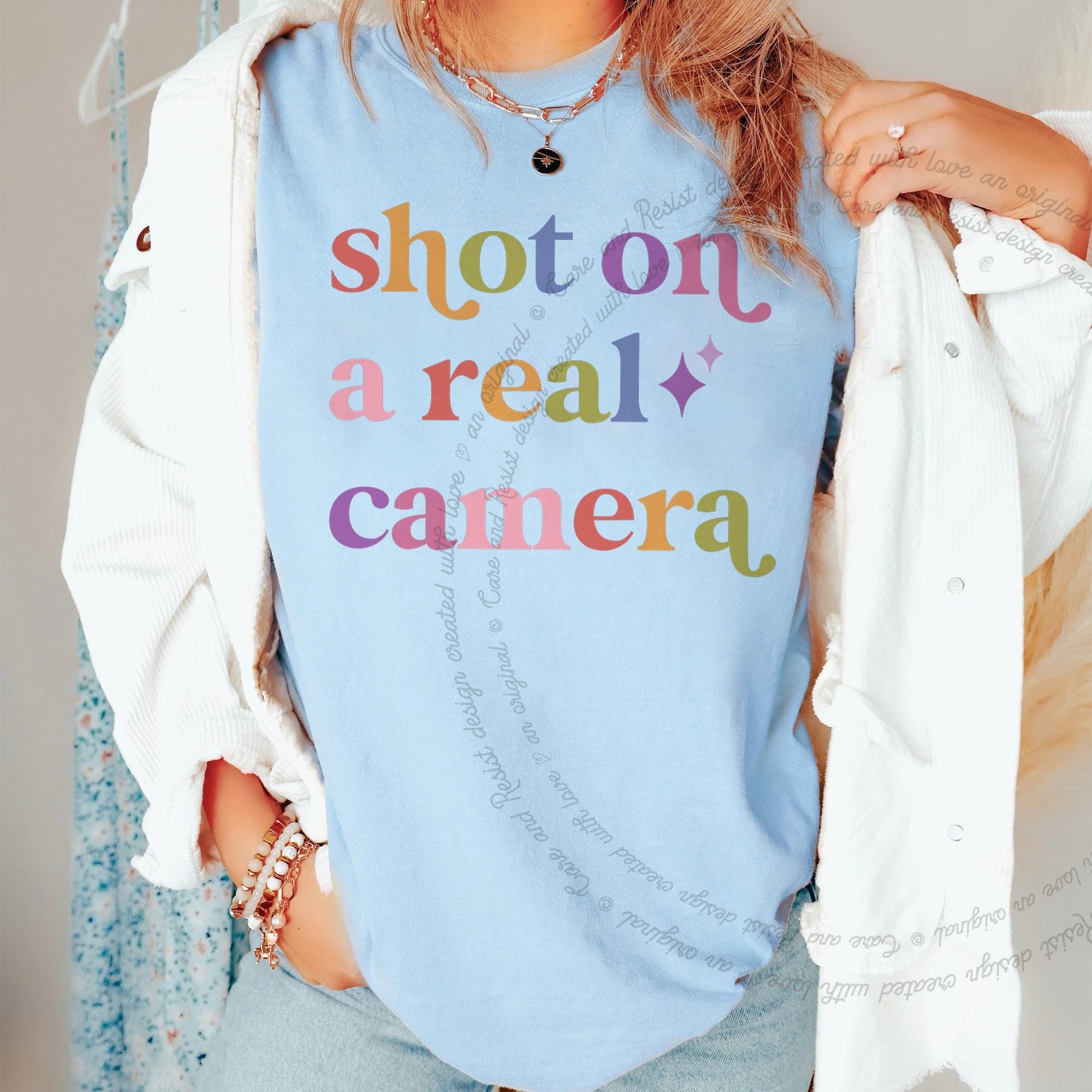 Shot on a Real Camera Care & Resist rainbow tee