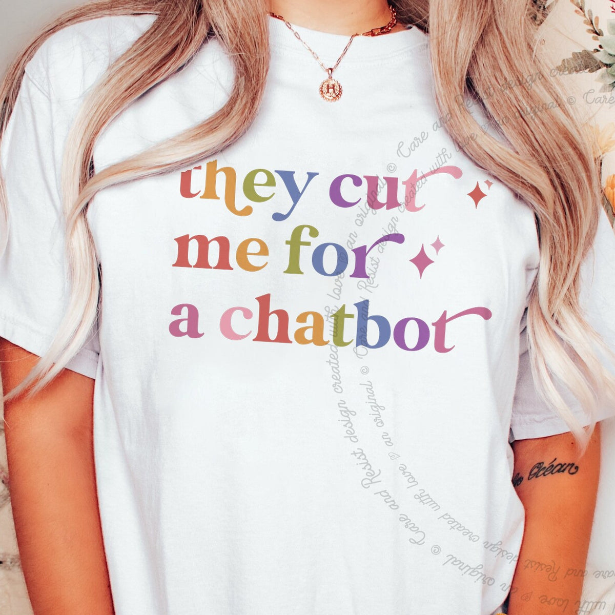 They Cut Me for a Chatbot Care & Resist rainbow tee