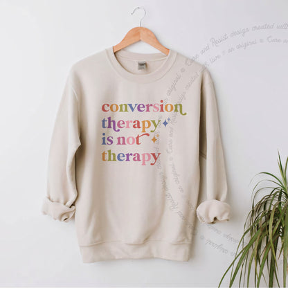 Conversion Therapy is not Therapy Care & Resist Gildan crewneck sweatshirt in Sand