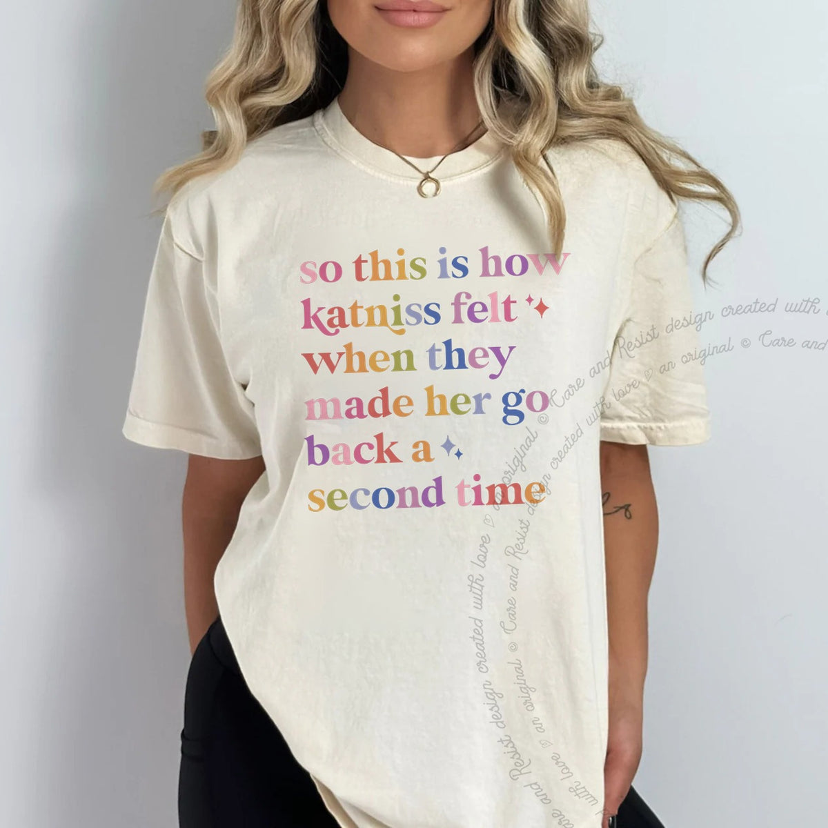 So This Is How Katniss Felt When They Made Her Go Back a Second Time Care & Resist progressive t-shirt in Ivory