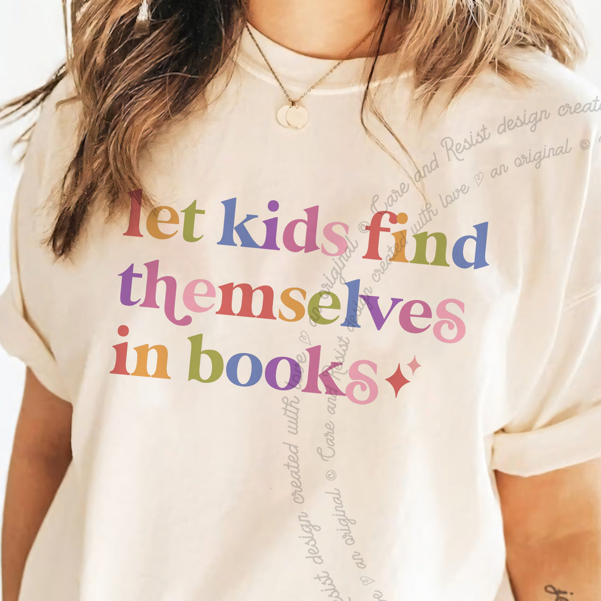 Let Kids Find Themselves in Books Care & Resist progressive t-shirt in Ivory