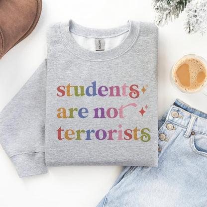 Students are not Terrorists Care & Resist Gildan crewneck sweatshirt in Sport Grey