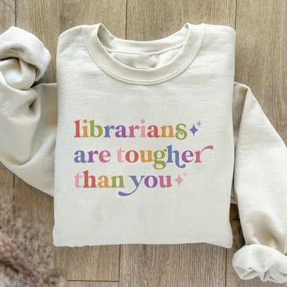 Librarians are Tougher Than You Care & Resist Gildan crewneck sweatshirt in Sand