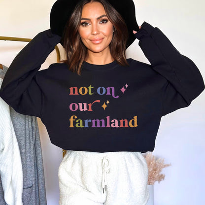 Not on Our Farmland Care & Resist Gildan crewneck sweatshirt in Black