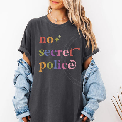 No Secret Police Care & Resist rainbow Comfort Colors tee, Graphite