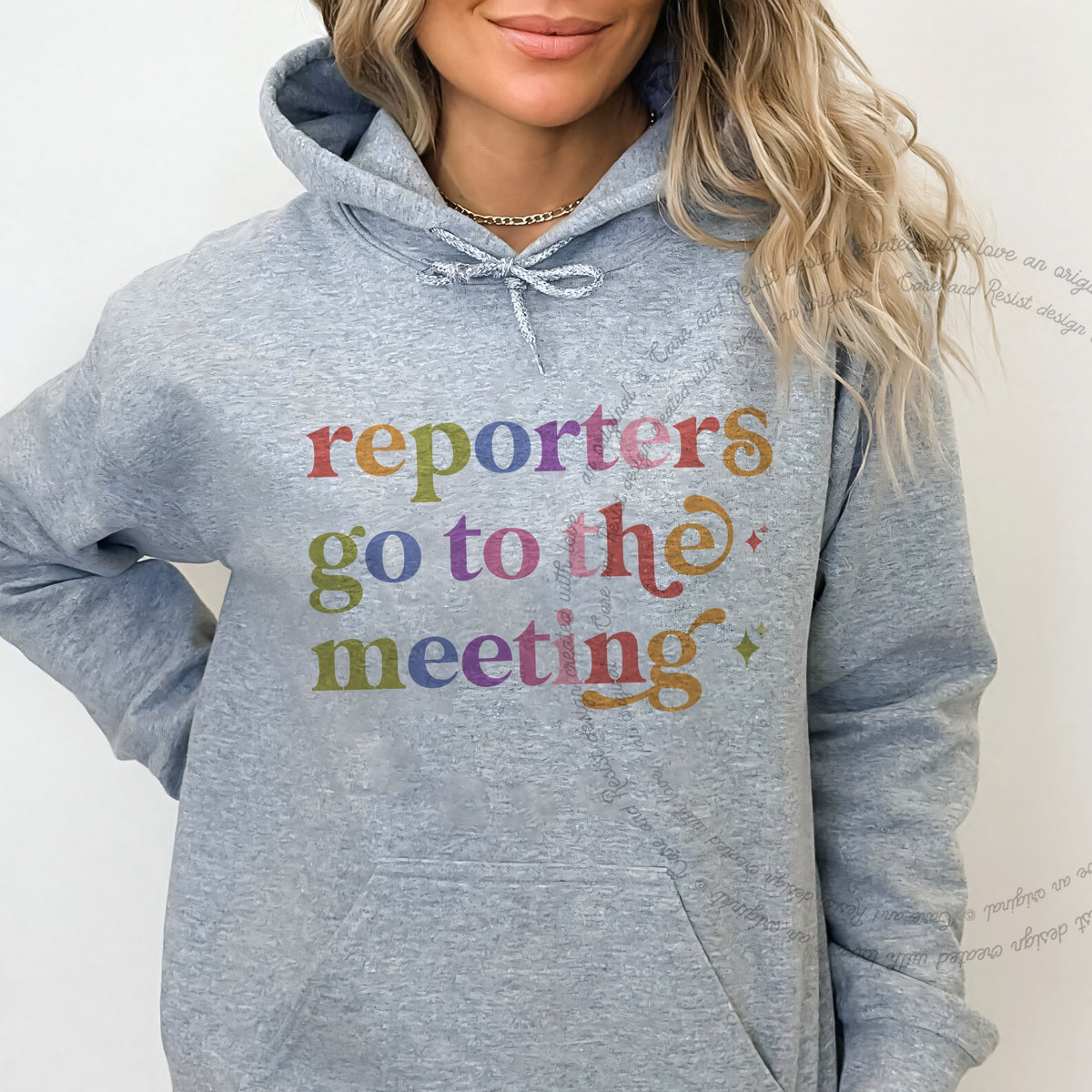 Reporters Go to the Meeting Care & Resist Gildan hoodie in Sport Grey