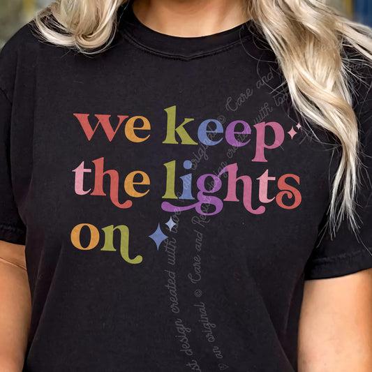 We Keep the Lights on Care & Resist progressive t-shirt in Black