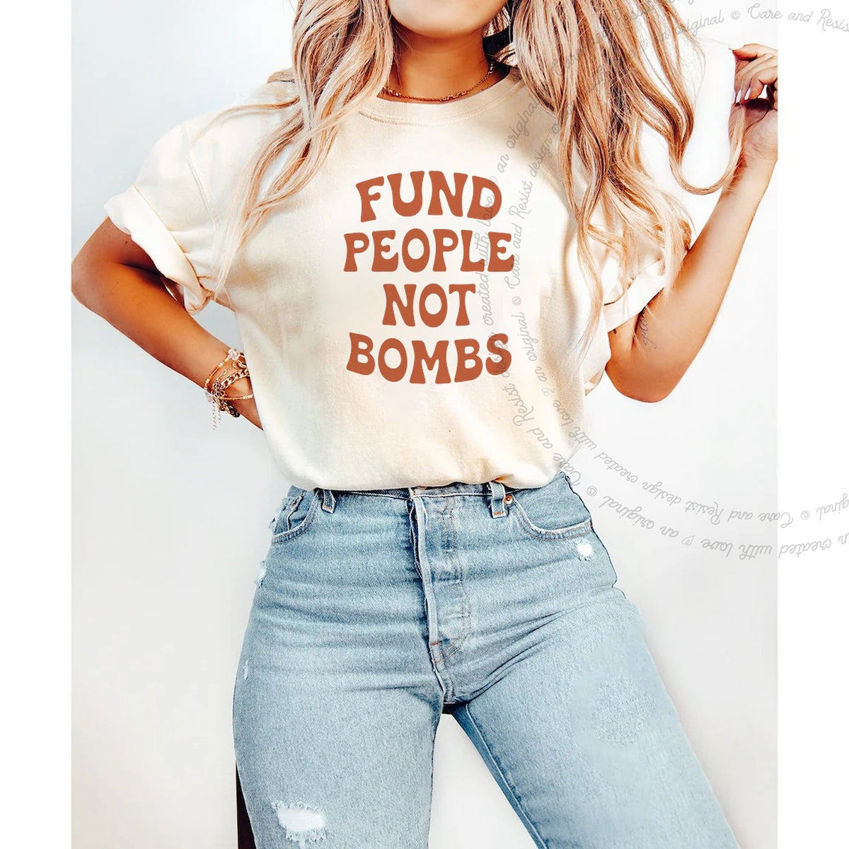 Fund People not Bombs Stacked Care & Resist progressive t-shirt in Ivory