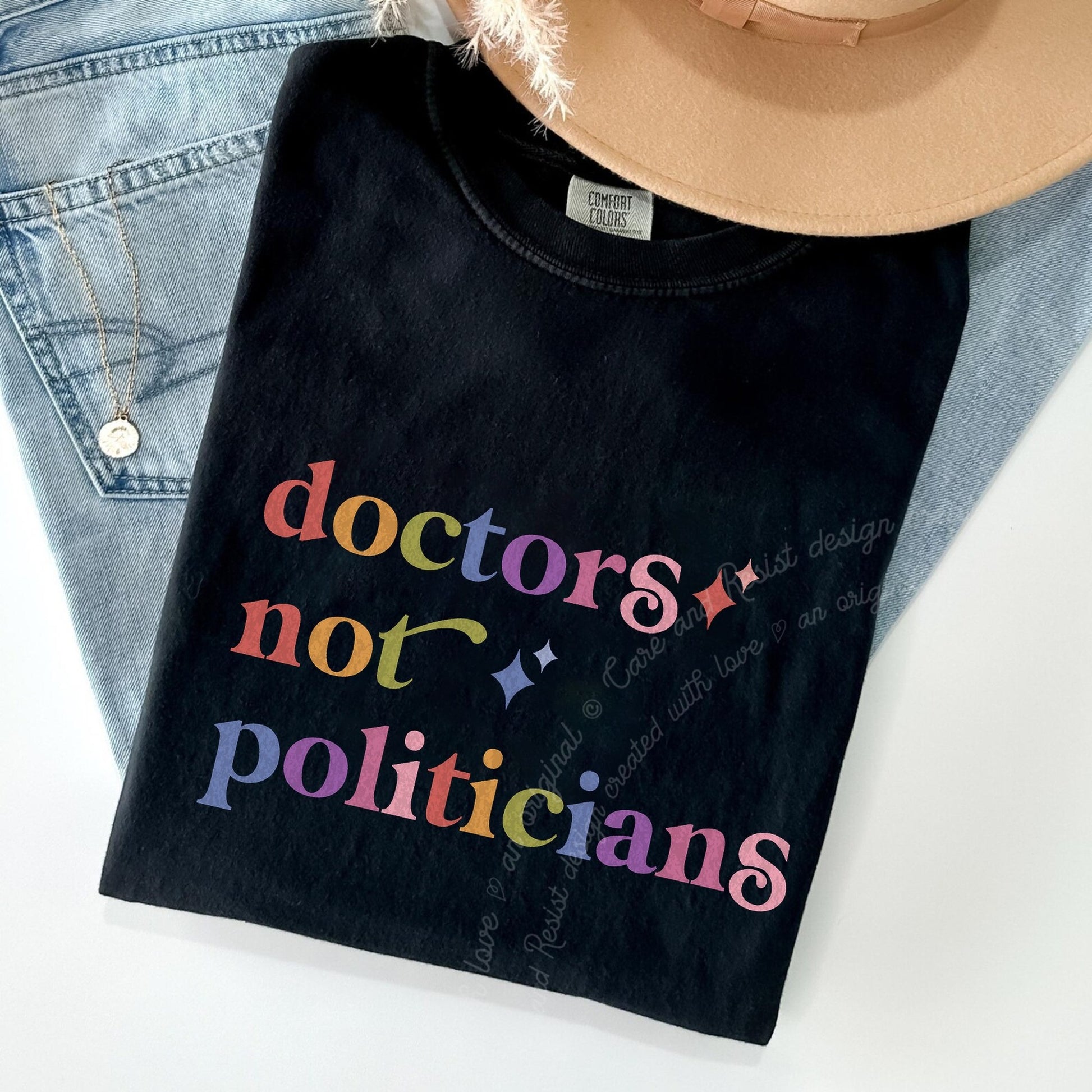 Doctors not Politicians Care & Resist rainbow Comfort Colors tee, Black