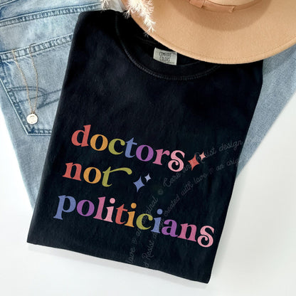 Doctors not Politicians Care & Resist rainbow Comfort Colors tee, Black