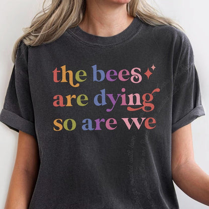 The Bees are Dying So are We Care & Resist rainbow Comfort Colors tee, Graphite
