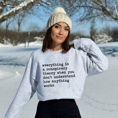 Everything Is a Conspiracy Theory When You Don't Understand How Anything Works Care & Resist Gildan crewneck sweatshirt in Sport Grey