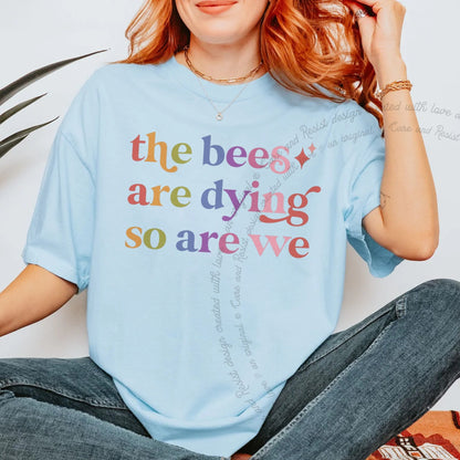 The Bees are Dying So are We Care & Resist rainbow Comfort Colors tee, Chambray