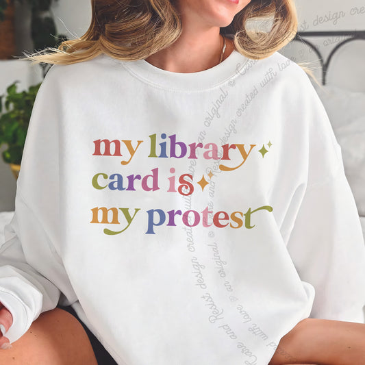 My Library Card is My Protest Care & Resist Gildan crewneck sweatshirt in White