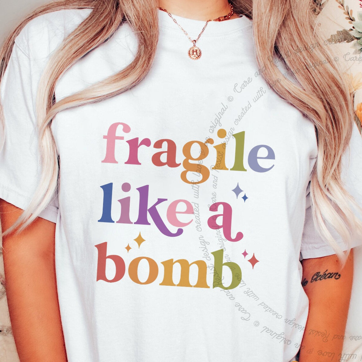 Fragile Like a Bomb Care & Resist progressive t-shirt in White