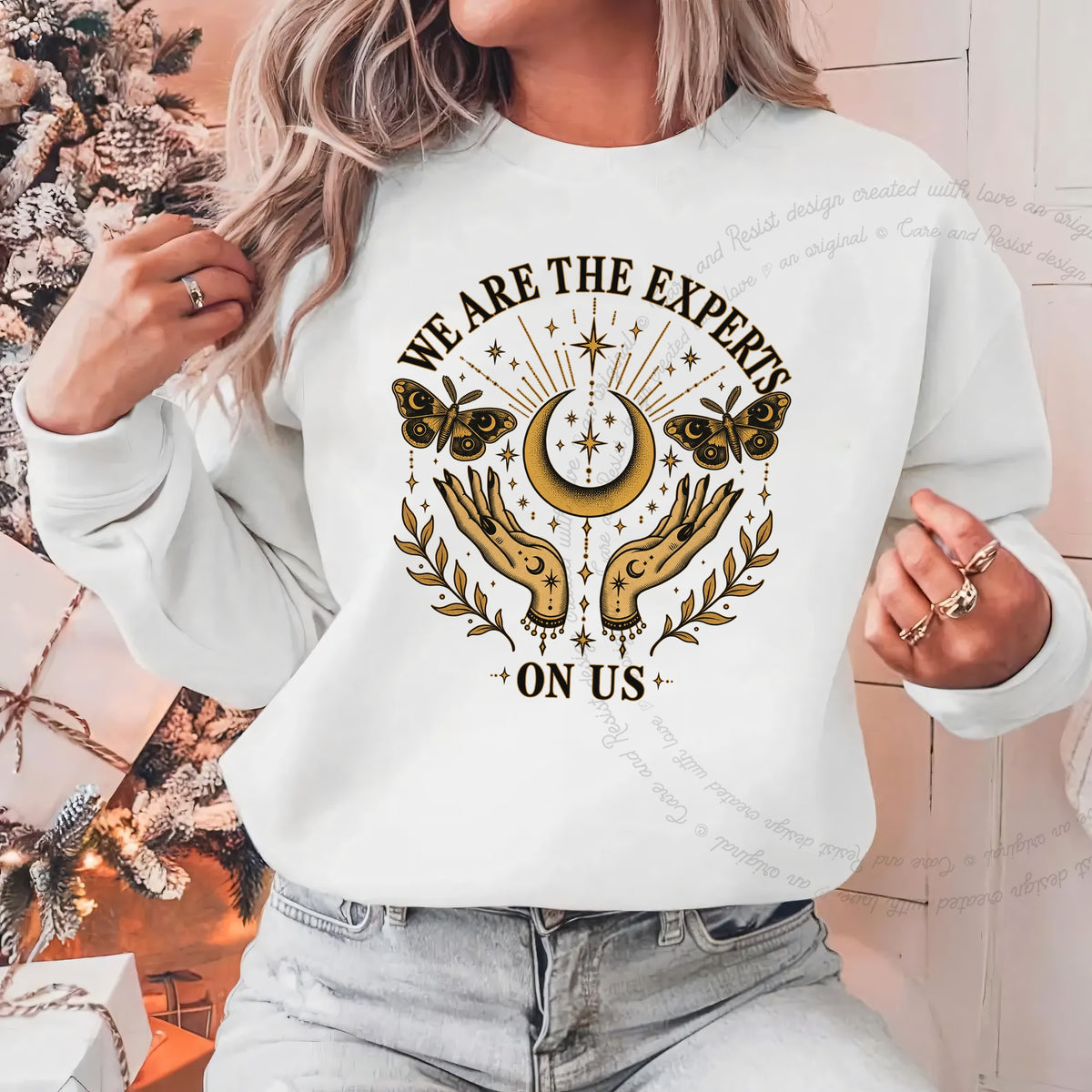 We are the Experts on Us Celestial Care & Resist Gildan crewneck sweatshirt in White