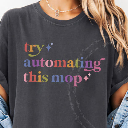 Try Automating This Mop Care & Resist tee in Graphite, close-up of the lettering