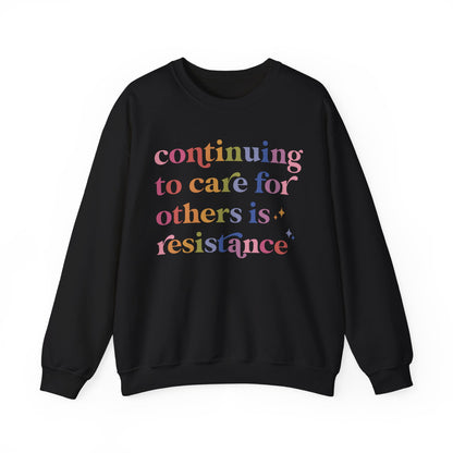 Continuing to Care for Others Is Resistance Sweatshirt