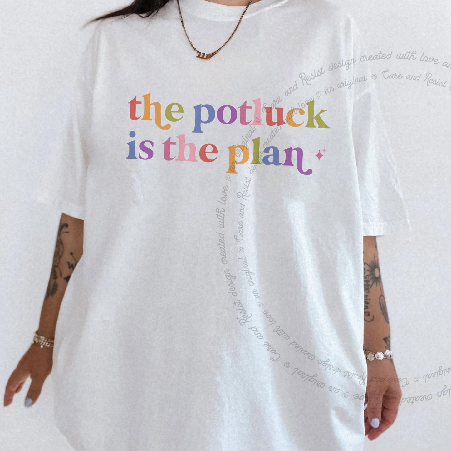 The Potluck is the Plan Care & Resist rainbow tee