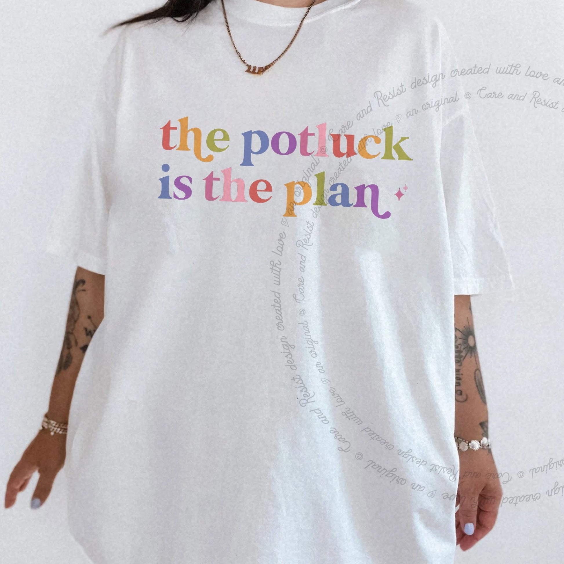 The Potluck is the Plan Care & Resist rainbow tee