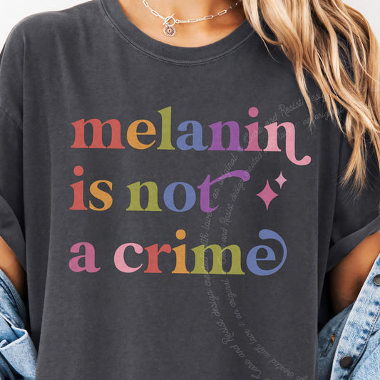 Melanin is not a Crime Care & Resist progressive t-shirt in Graphite