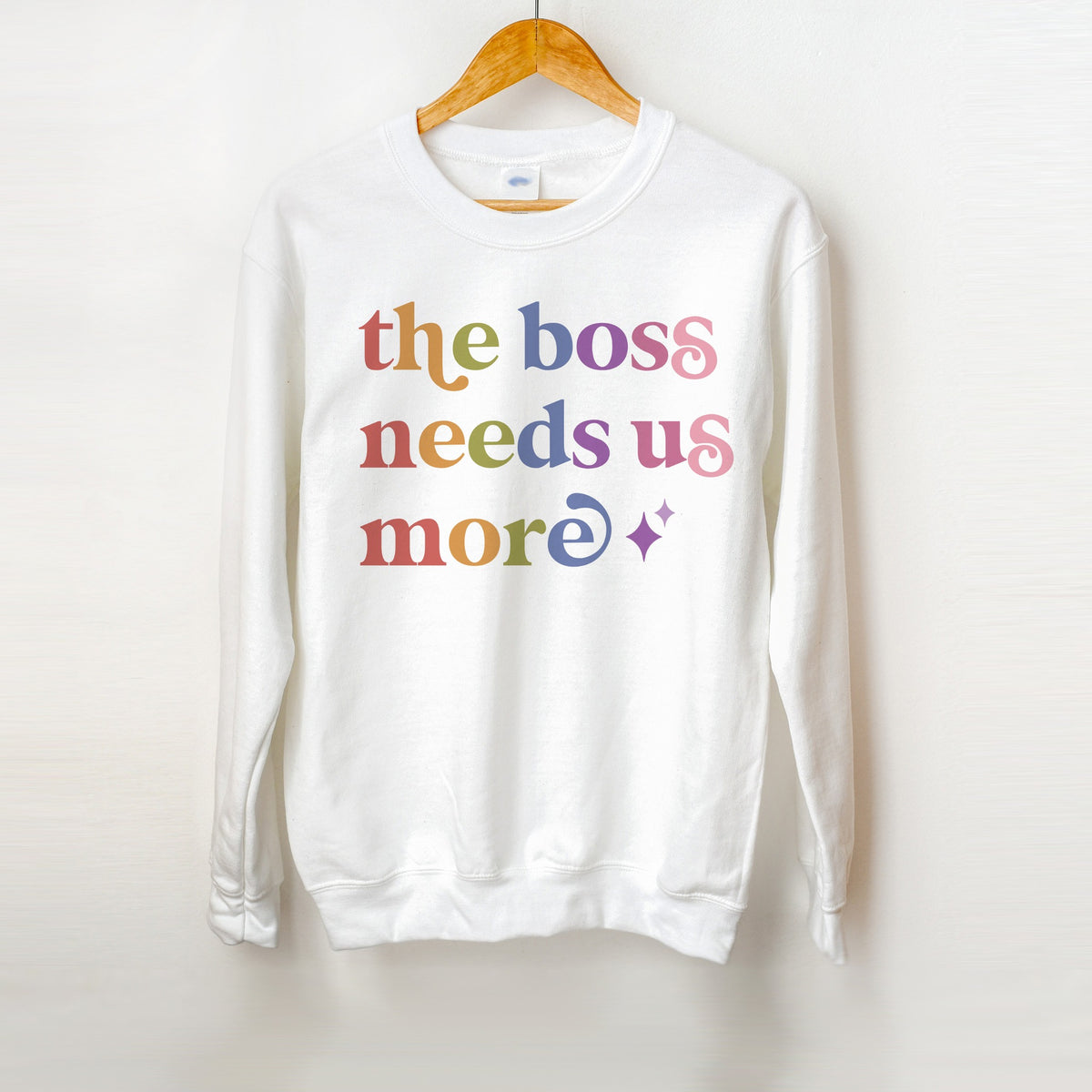 The Boss Needs Us More Care & Resist Gildan crewneck sweatshirt in White