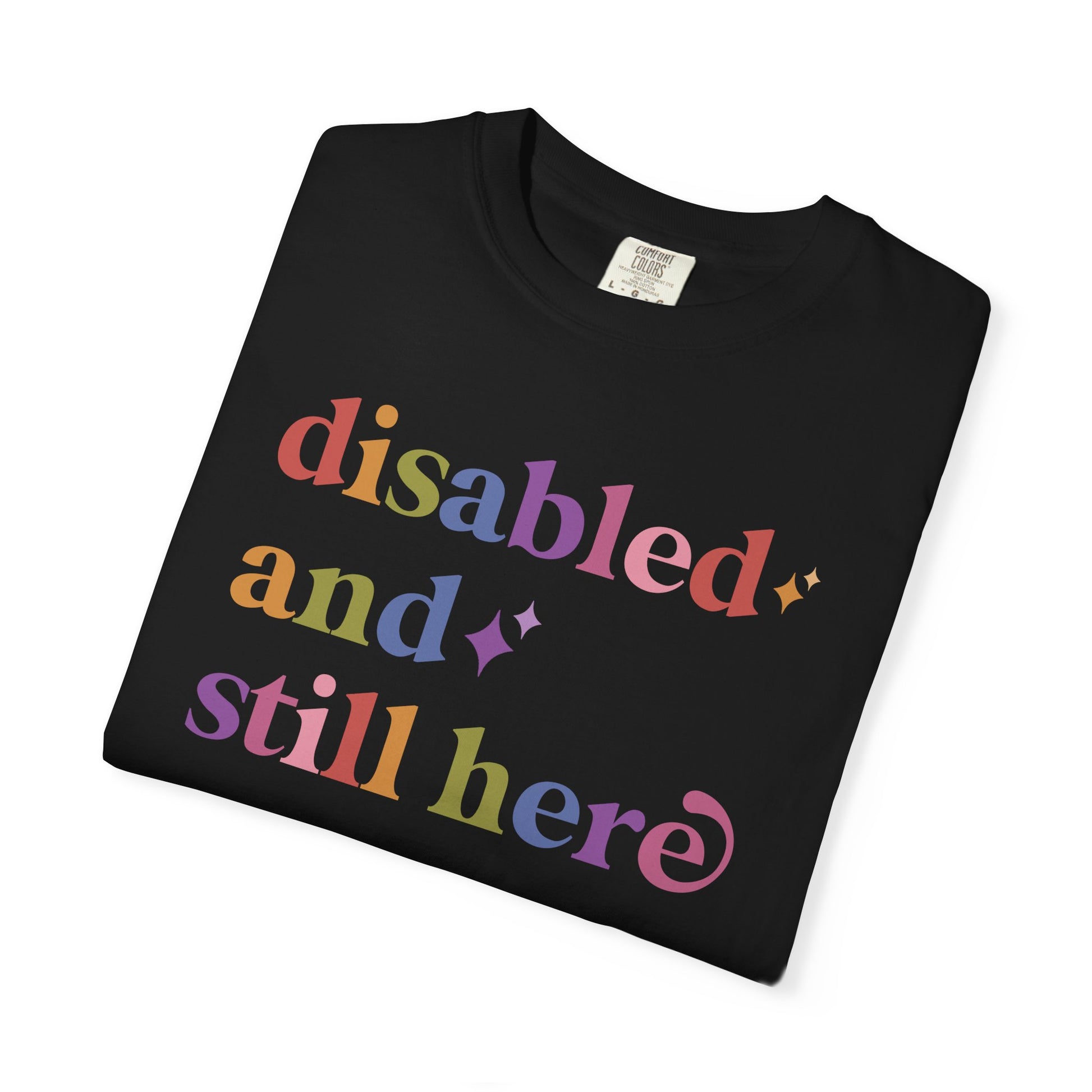 Disabled and Still Here Care & Resist rainbow Comfort Colors tee