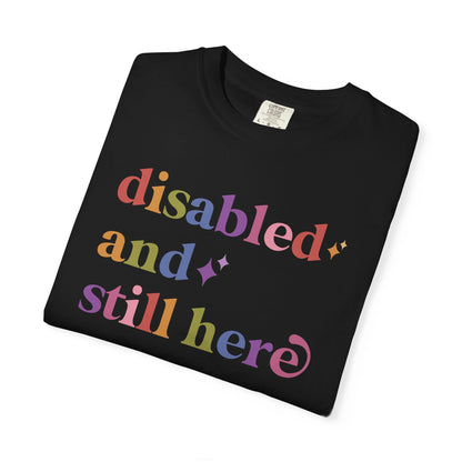 Disabled and Still Here Care & Resist rainbow Comfort Colors tee