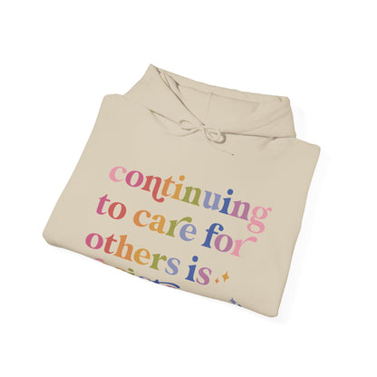 Continuing to Care for Others Is Resistance Hoodie