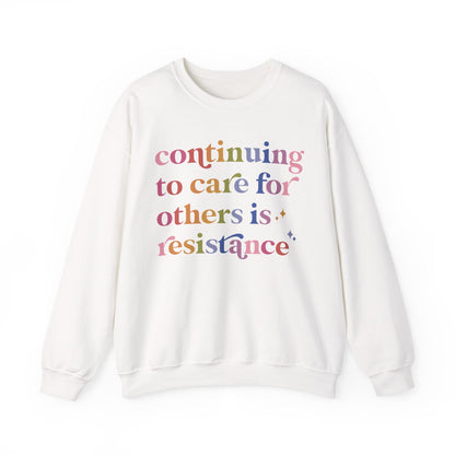 Continuing to Care for Others Is Resistance Sweatshirt