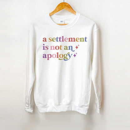 A Settlement is not an Apology Care & Resist Gildan crewneck sweatshirt in White