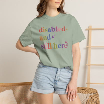 Disabled and Still Here Care & Resist rainbow Comfort Colors tee