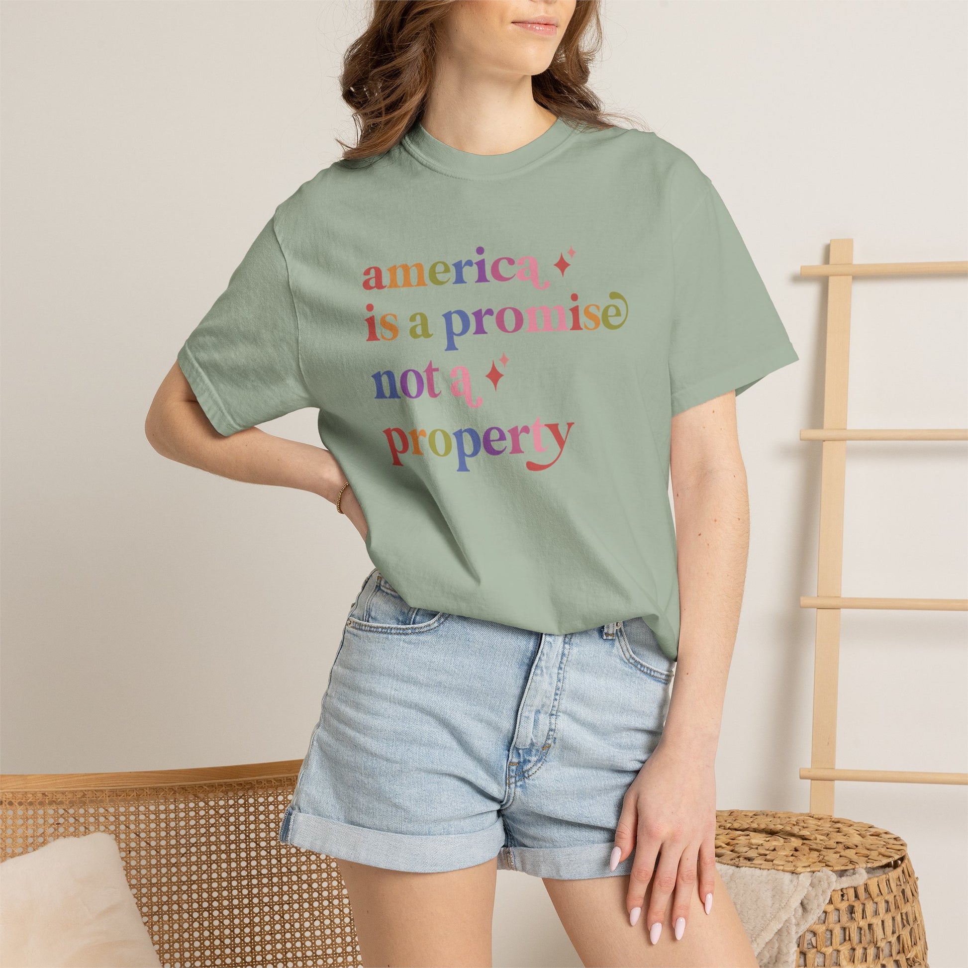 America is a Promise not a Property Care & Resist rainbow Comfort Colors tee