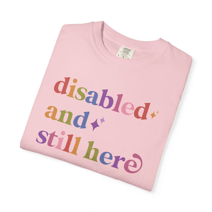 Disabled and Still Here Care & Resist rainbow Comfort Colors tee