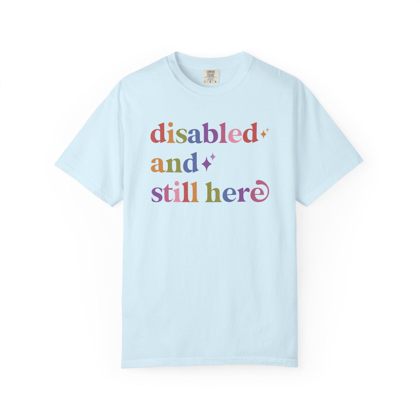 Disabled and Still Here Care & Resist rainbow Comfort Colors tee