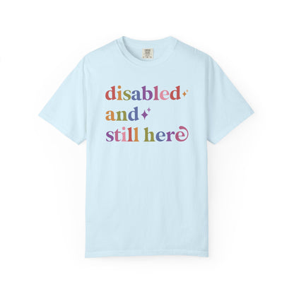 Disabled and Still Here Care & Resist rainbow Comfort Colors tee