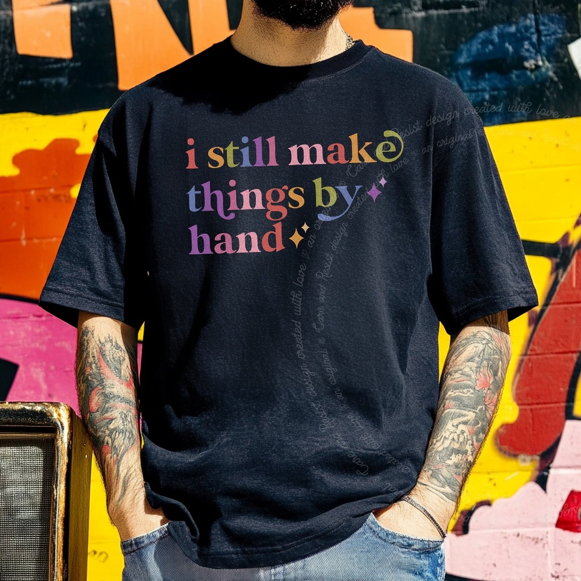 I Still Make Things By Hand Care & Resist rainbow tee