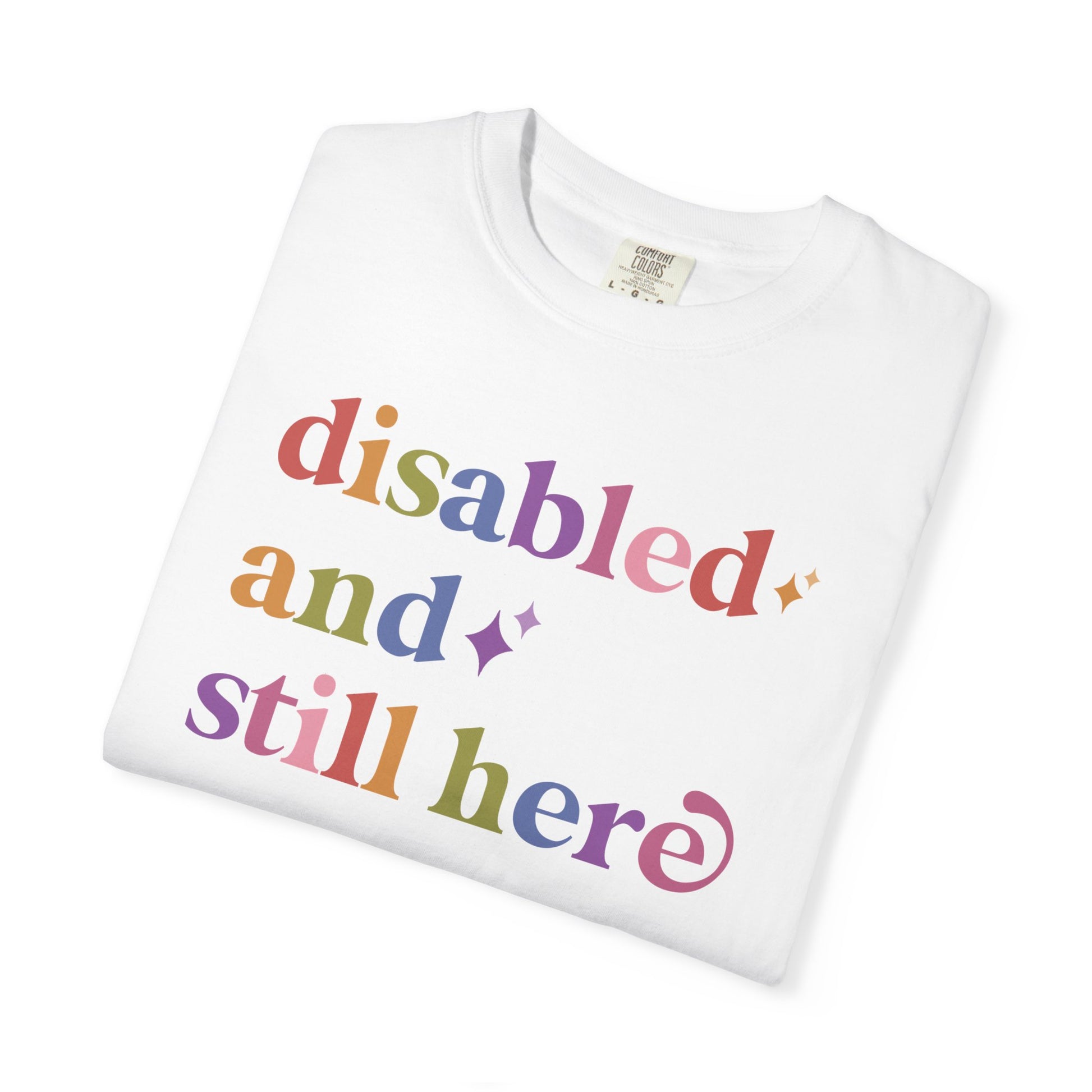 Disabled and Still Here Care & Resist rainbow Comfort Colors tee