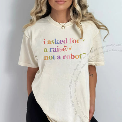 I Asked for a Raise not a Robot Care & Resist rainbow Comfort Colors tee, Ivory