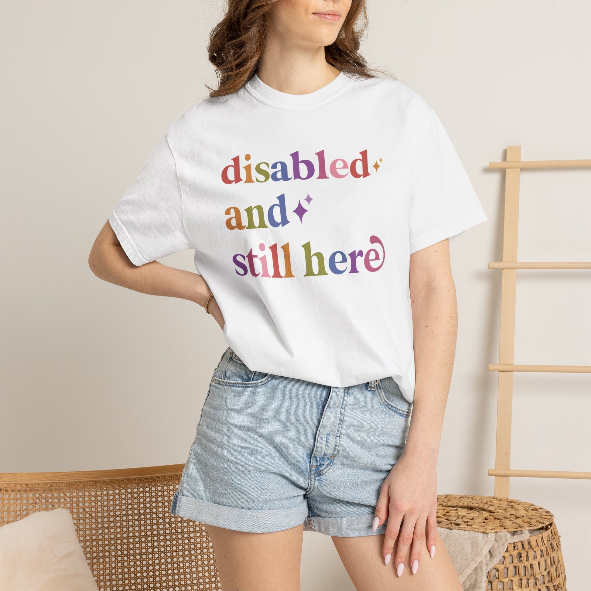 Disabled and Still Here Care & Resist rainbow Comfort Colors tee