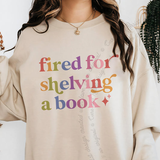 Fired for Shelving a Book Care & Resist Gildan crewneck sweatshirt in Sand